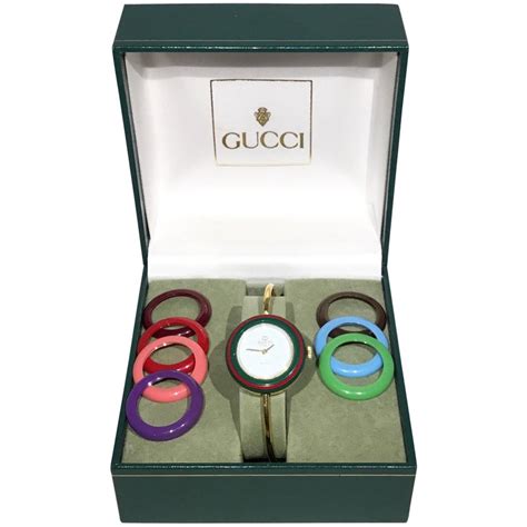 vintage gucci claw link gold tone watch with black bezel|Gucci watch interchangeable bezels.